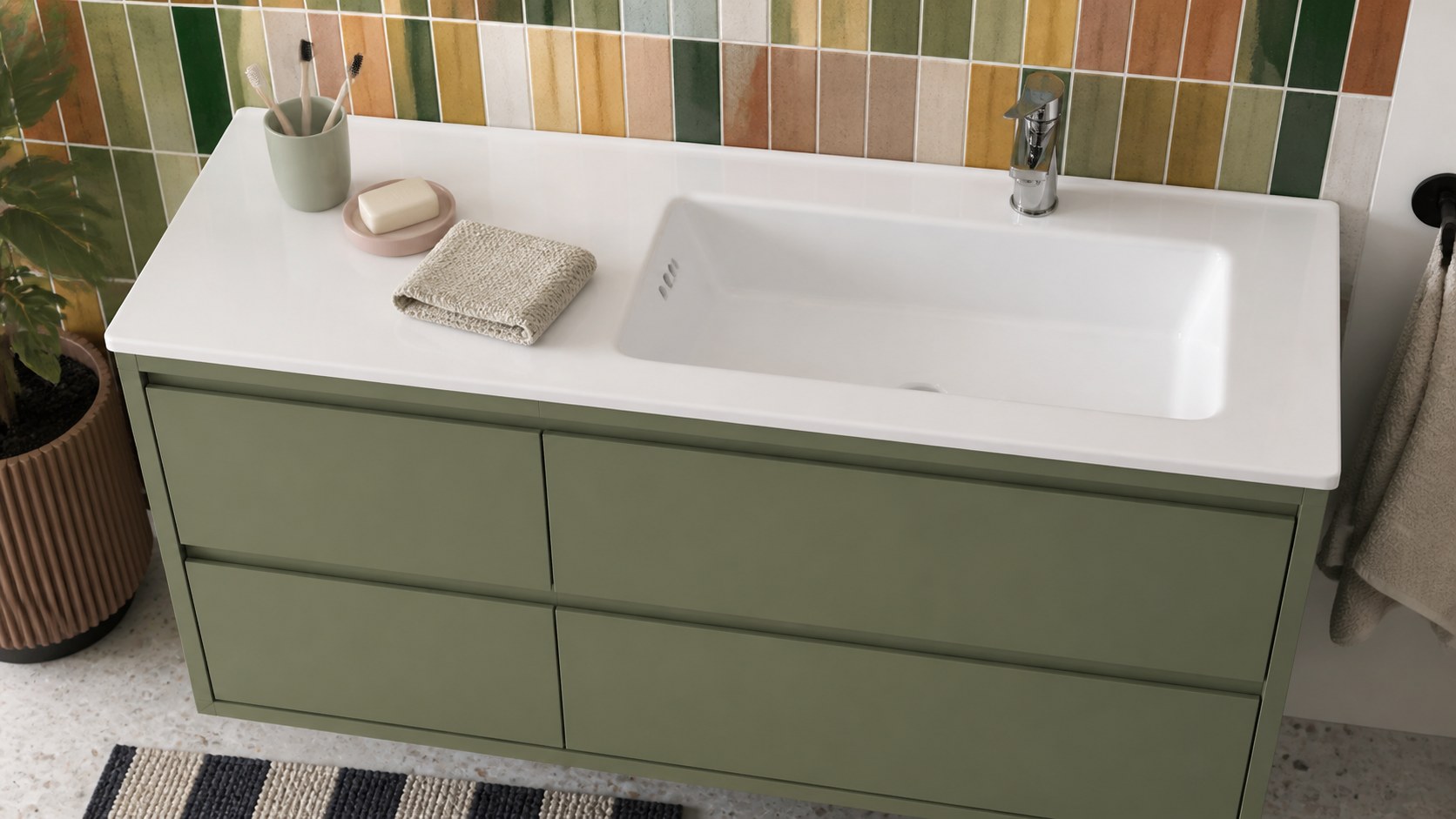 Right-offset vanity basin with practical items in a family apartment bathroom