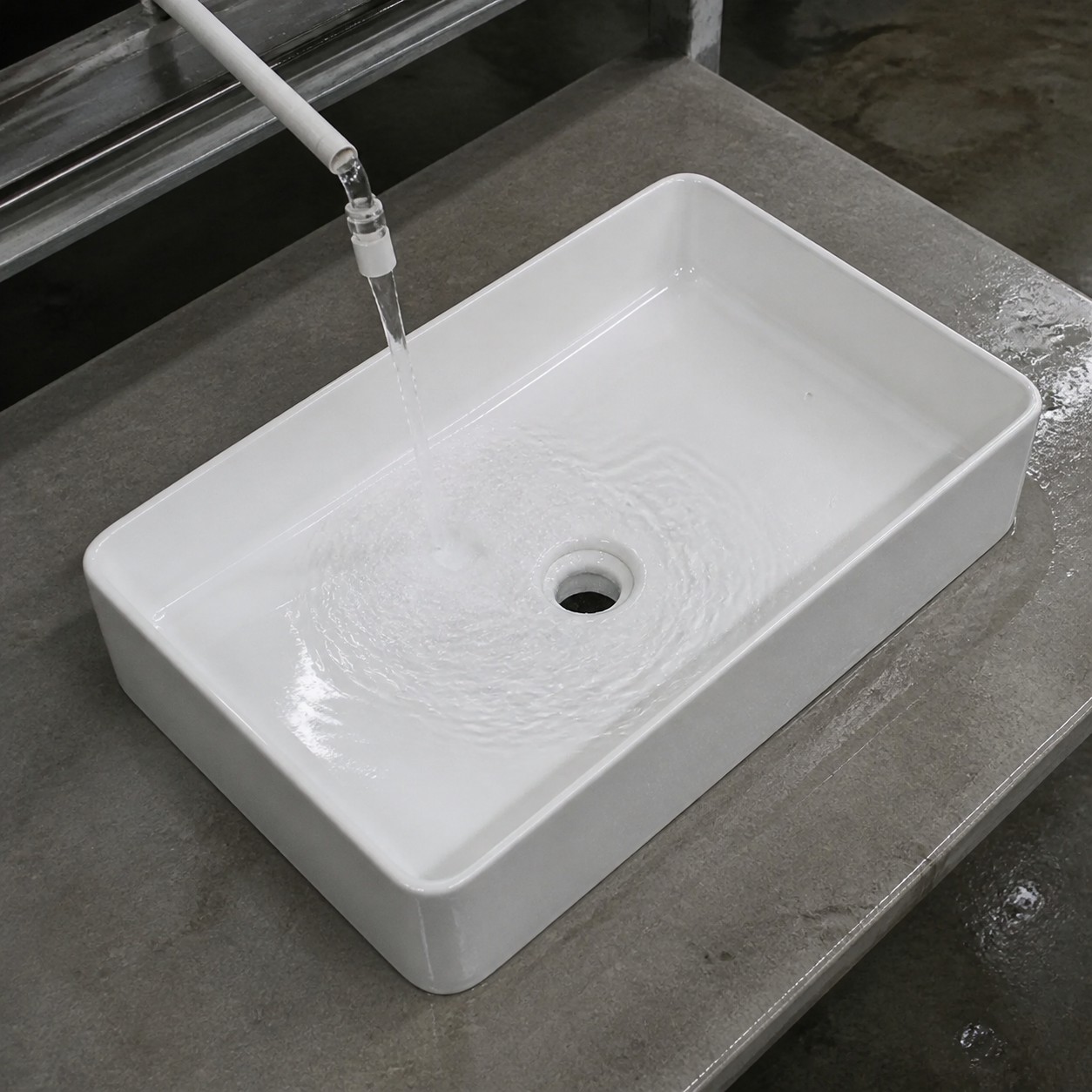 Ceramic vessel sink bowl geometry under controlled water test