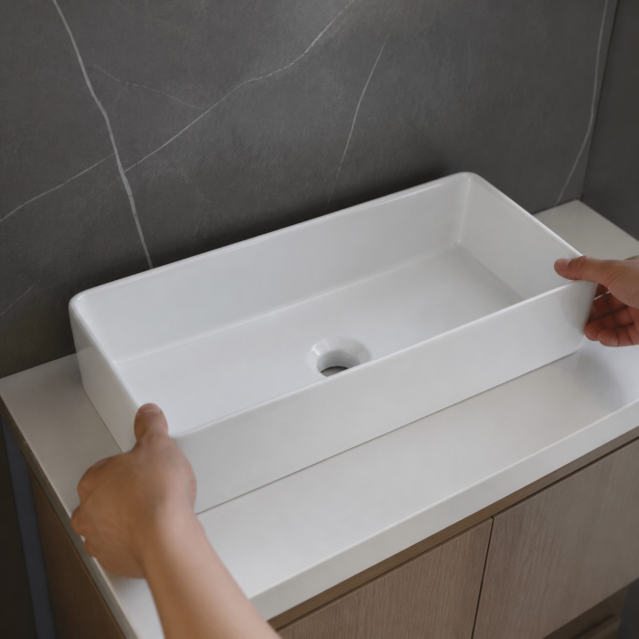 Ceramic vessel sink dry-fitted over model-specific countertop opening