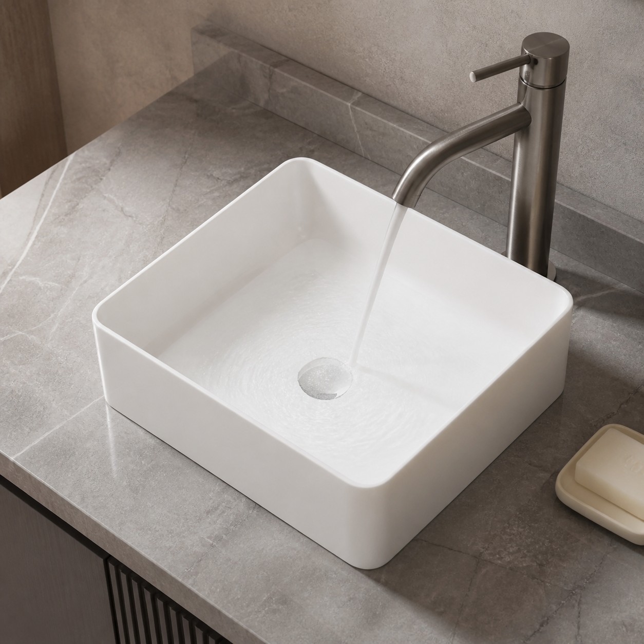 Controlled faucet stream landing inside a special-shape vessel sink