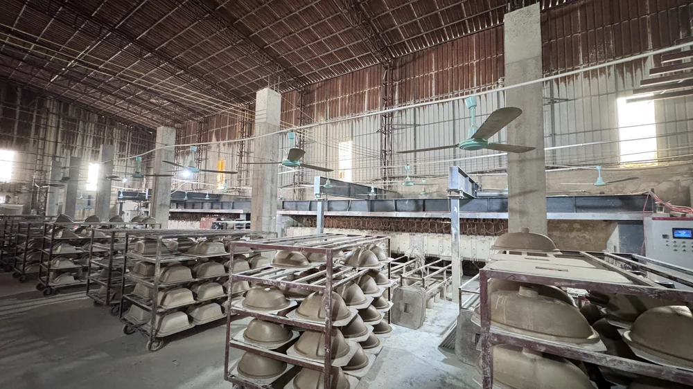 High-pressure slip-casting at Chengda — liquid clay formed in pressure moulds